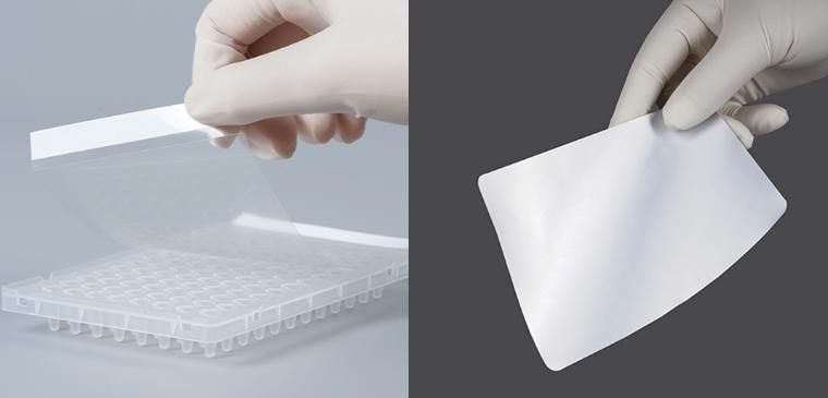 Self-adhesive PCR films